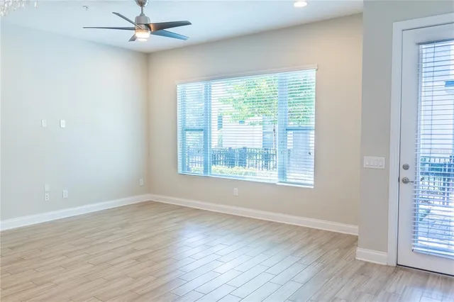 a kitchen with a sink and chandelier