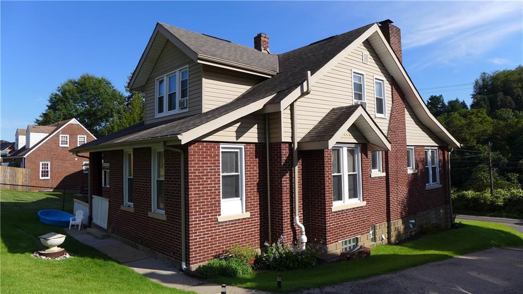 1097 Broughton Road Pittsburgh, PA 15236 - Photo 1 of 25 Solid brick, classic Pittsburgh house.