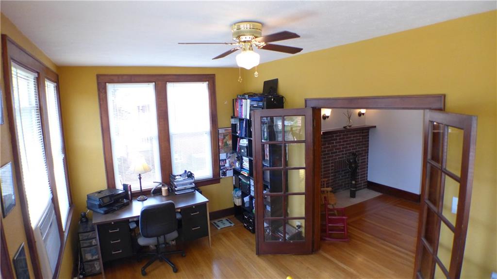 1097 Broughton Road Pittsburgh, PA 15236 - Photo 5 of 25 Another suspected porch conversion! This one into an office with tons of natural light, lighted ceiling fans & French doors.
