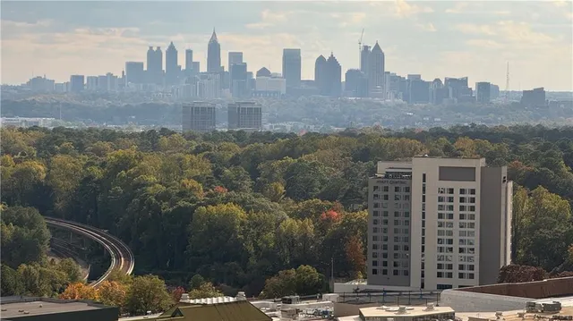 a view of a city with tall buildings