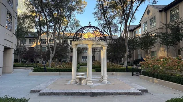 a blue painted room with a couch next to a window