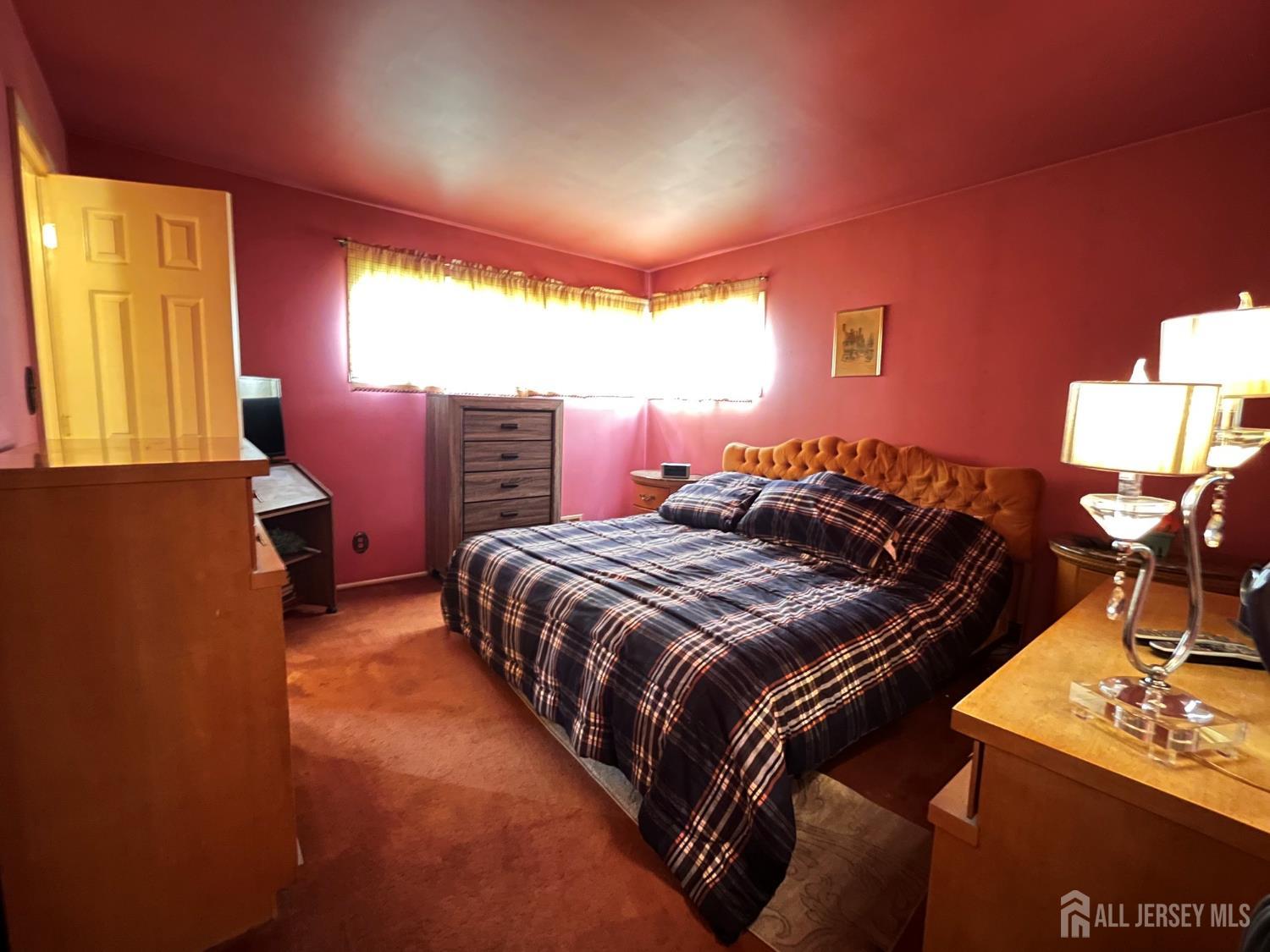 11 Purdue Road Old Bridge, NJ 08859 - Photo 12 of 14 a bedroom with a bed and window