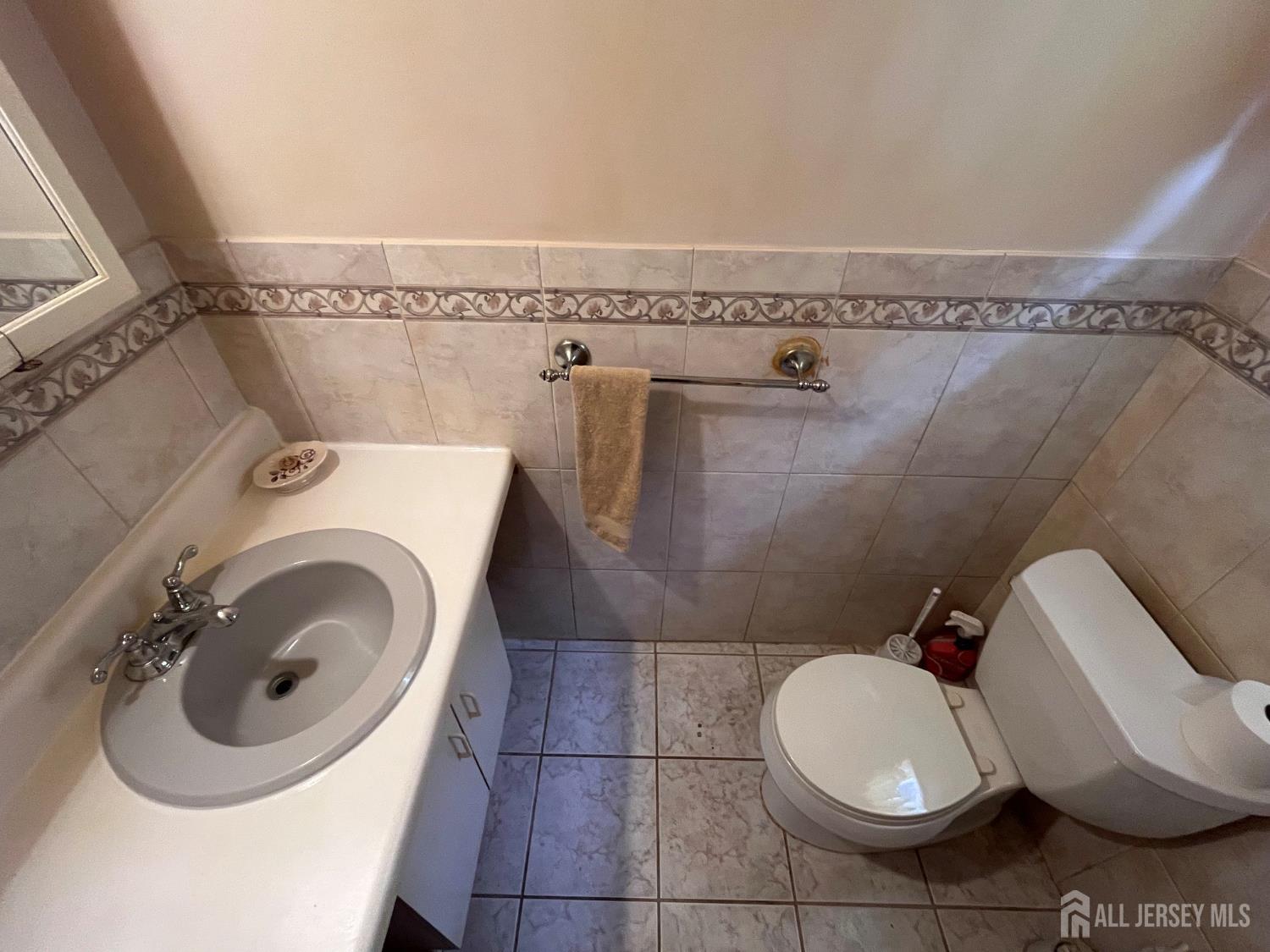 11 Purdue Road Old Bridge, NJ 08859 - Photo 13 of 14 a bathroom with a toilet and a sink