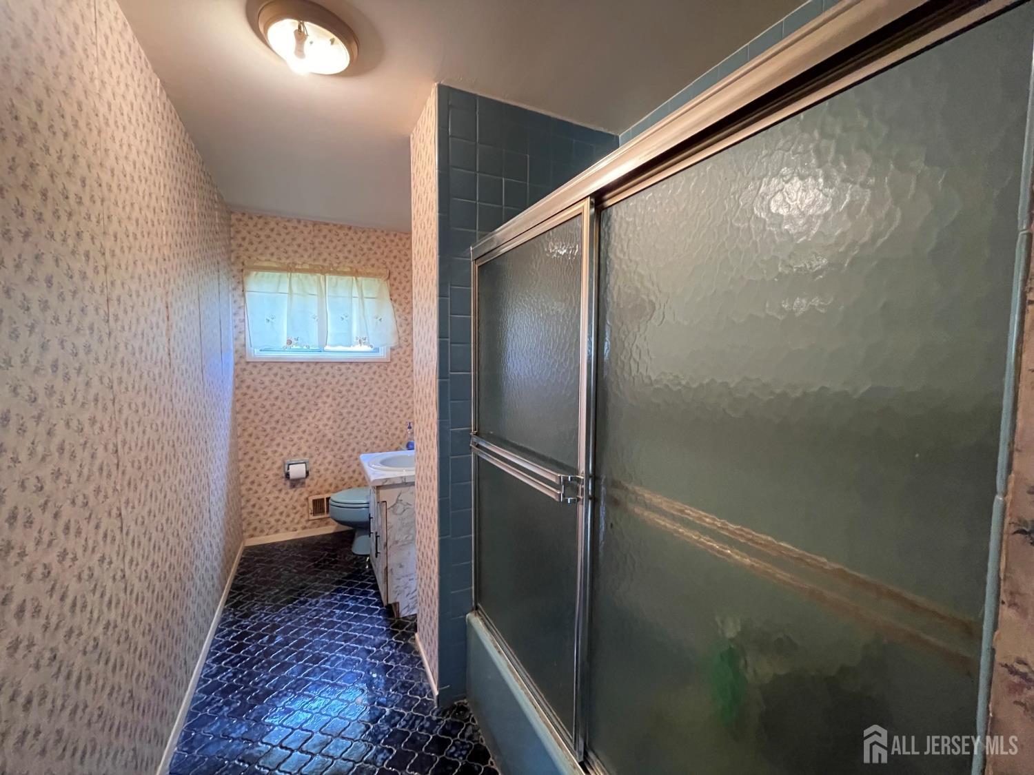 11 Purdue Road Old Bridge, NJ 08859 - Photo 8 of 14 a bathroom with a toilet and a shower