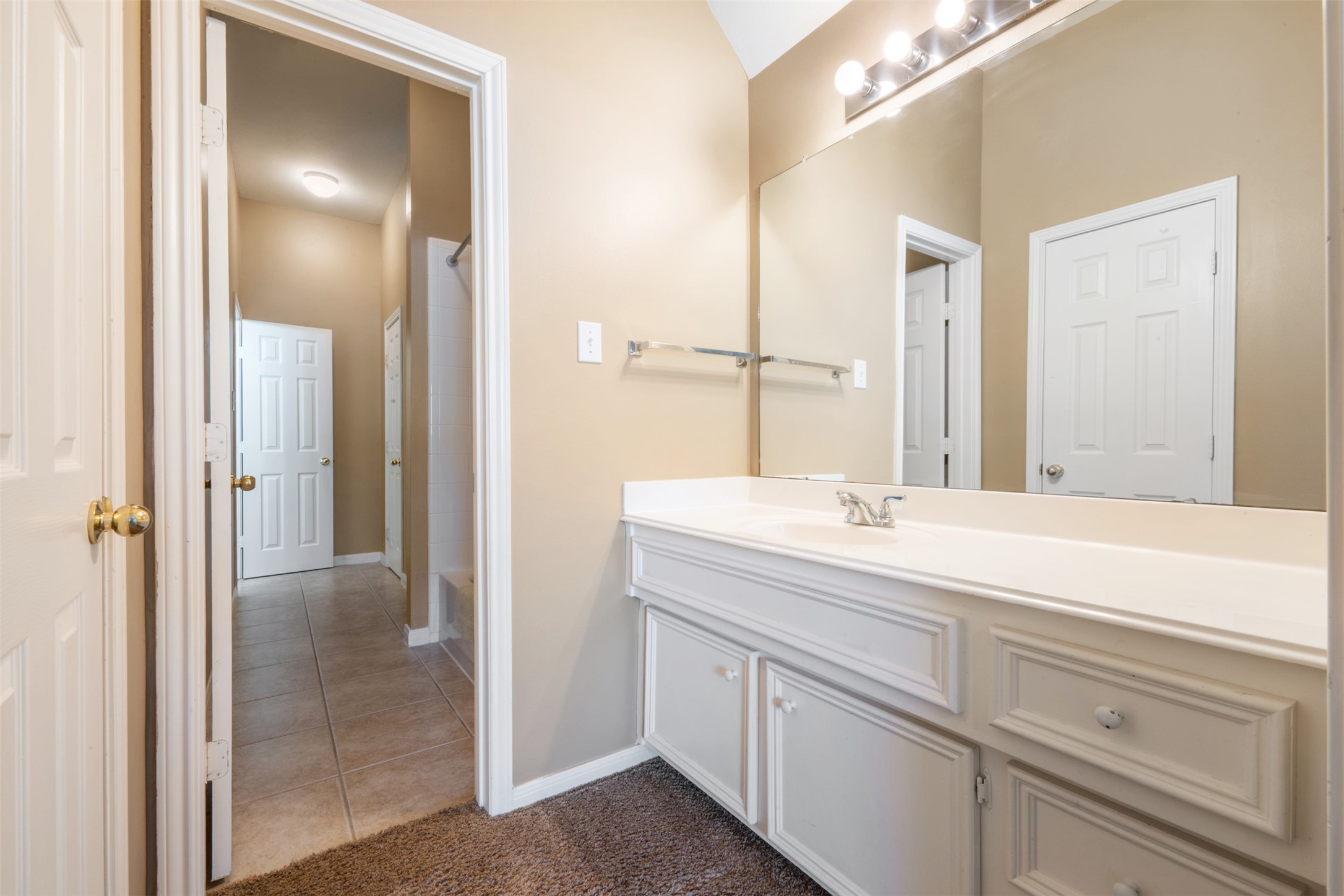 7023 Timber Edge Lane Humble, TX 77346 - Photo 19 of 37 a bathroom with a sink and a mirror