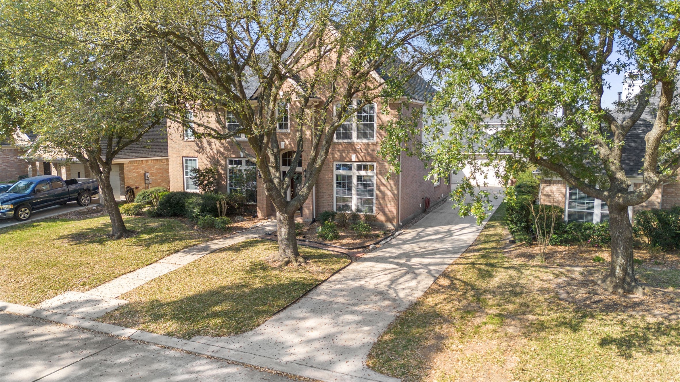 7023 Timber Edge Lane Humble, TX 77346 - Photo 32 of 37 a view of a yard with a tree