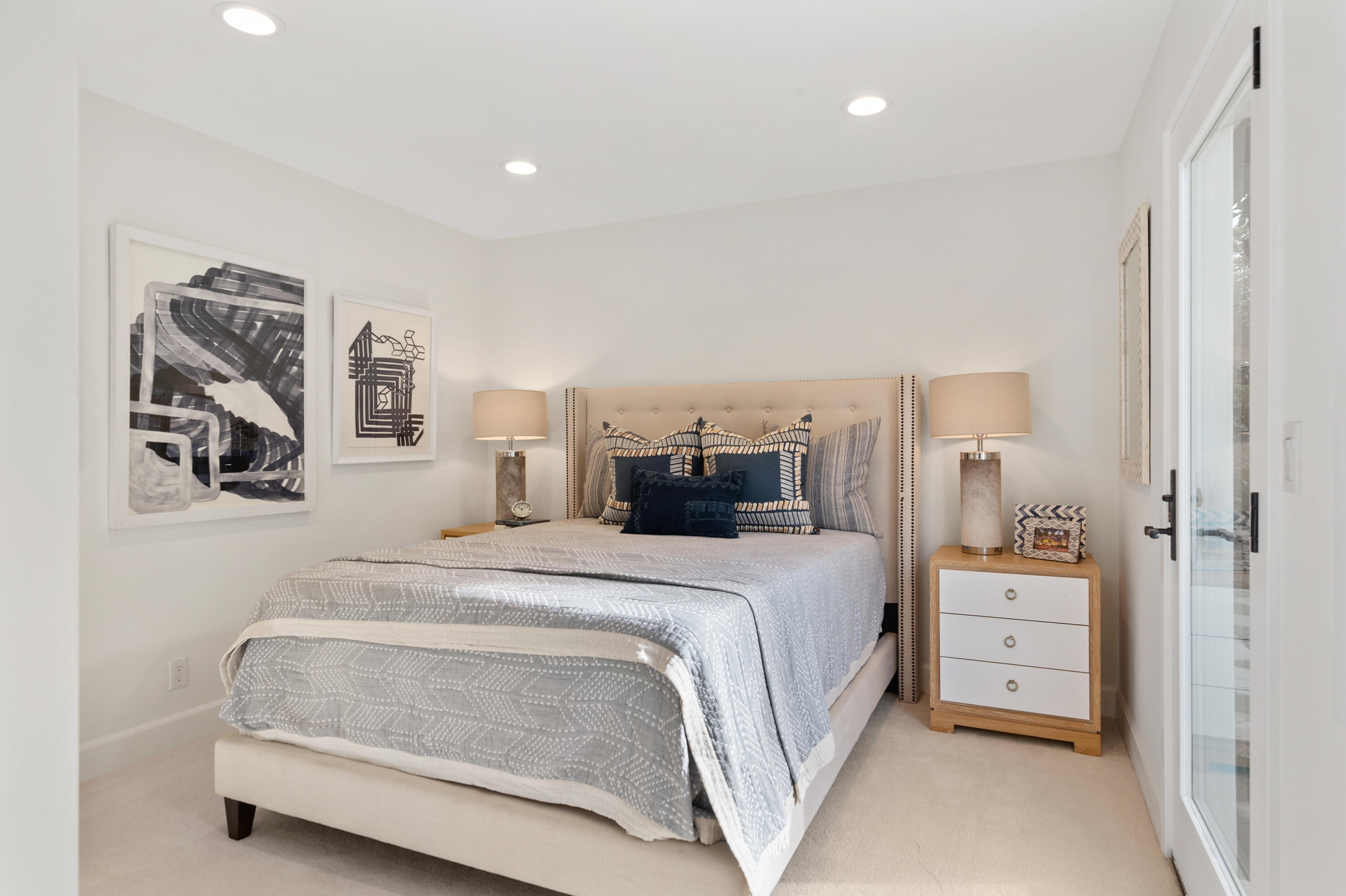 104 La Vereda Road Montecito, CA 93108 - Photo 11 of 15 a bedroom with a bed and a painting on the wall