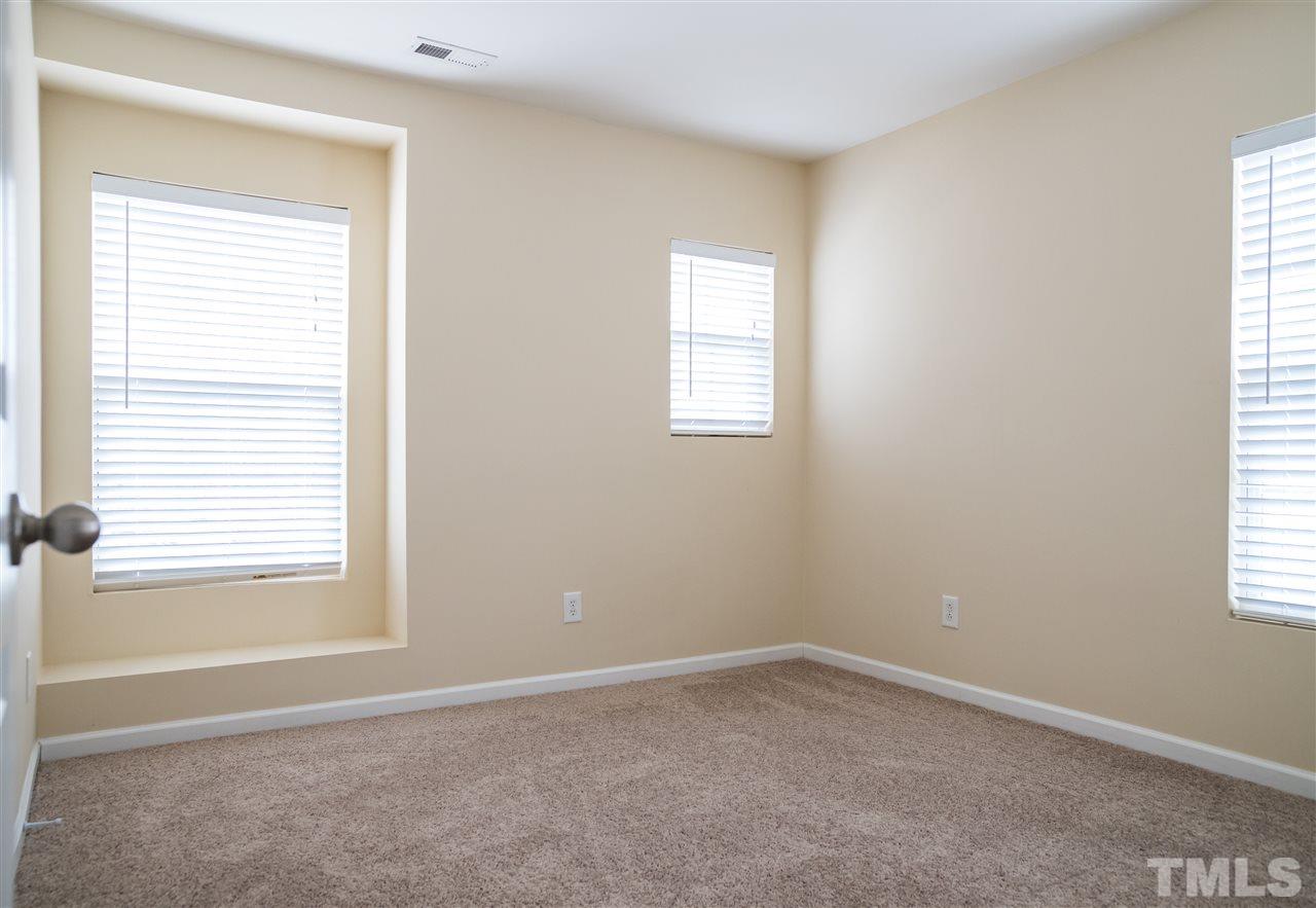 181 Depot Ridge Road Garner, NC 27529 - Photo 13 of 21 Another Secondary Bedroom has Window Seat and New Carpet