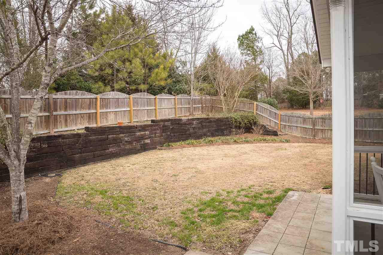 181 Depot Ridge Road Garner, NC 27529 - Photo 16 of 21 Two-Tiered Flat and Fenced Back Yard