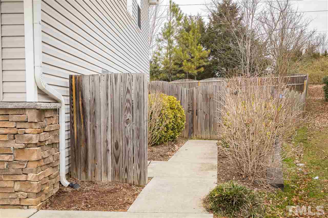 181 Depot Ridge Road Garner, NC 27529 - Photo 19 of 21 Sidewalk Leads to Fenced Back Yard