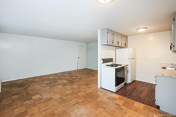 1233 Melville Road, Unit 24 Farmingdale, NY 11735 - Photo 29 of 40 facing living area
