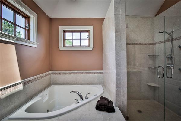170 Central Avenue Needham, MA 02494 - Photo 17 of 30 a bathroom with a bathtub