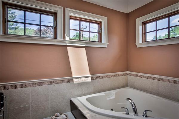 170 Central Avenue Needham, MA 02494 - Photo 18 of 30 a bathroom with a bathtub and window