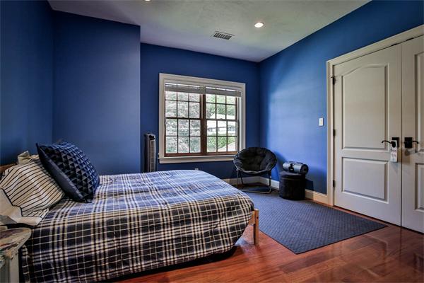 170 Central Avenue Needham, MA 02494 - Photo 24 of 30 a bedroom with a bed and a couch