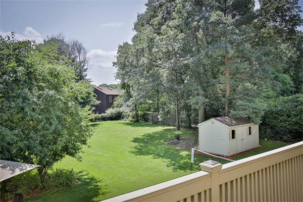 170 Central Avenue Needham, MA 02494 - Photo 28 of 30 a green field with trees in the background