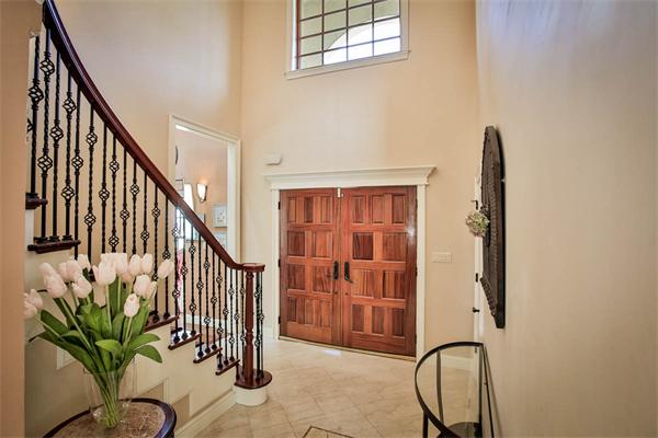 170 Central Avenue Needham, MA 02494 - Photo 3 of 30 a view of staircase with wooden floor and a potted plant