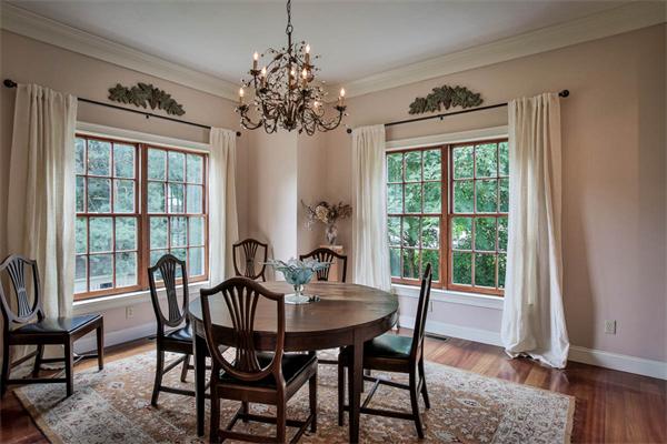 170 Central Avenue Needham, MA 02494 - Photo 6 of 30 a view of a dining room with furniture a chandelier and wooden floor