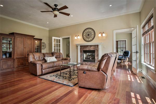 170 Central Avenue Needham, MA 02494 - Photo 10 of 30 a living room with furniture and a fireplace