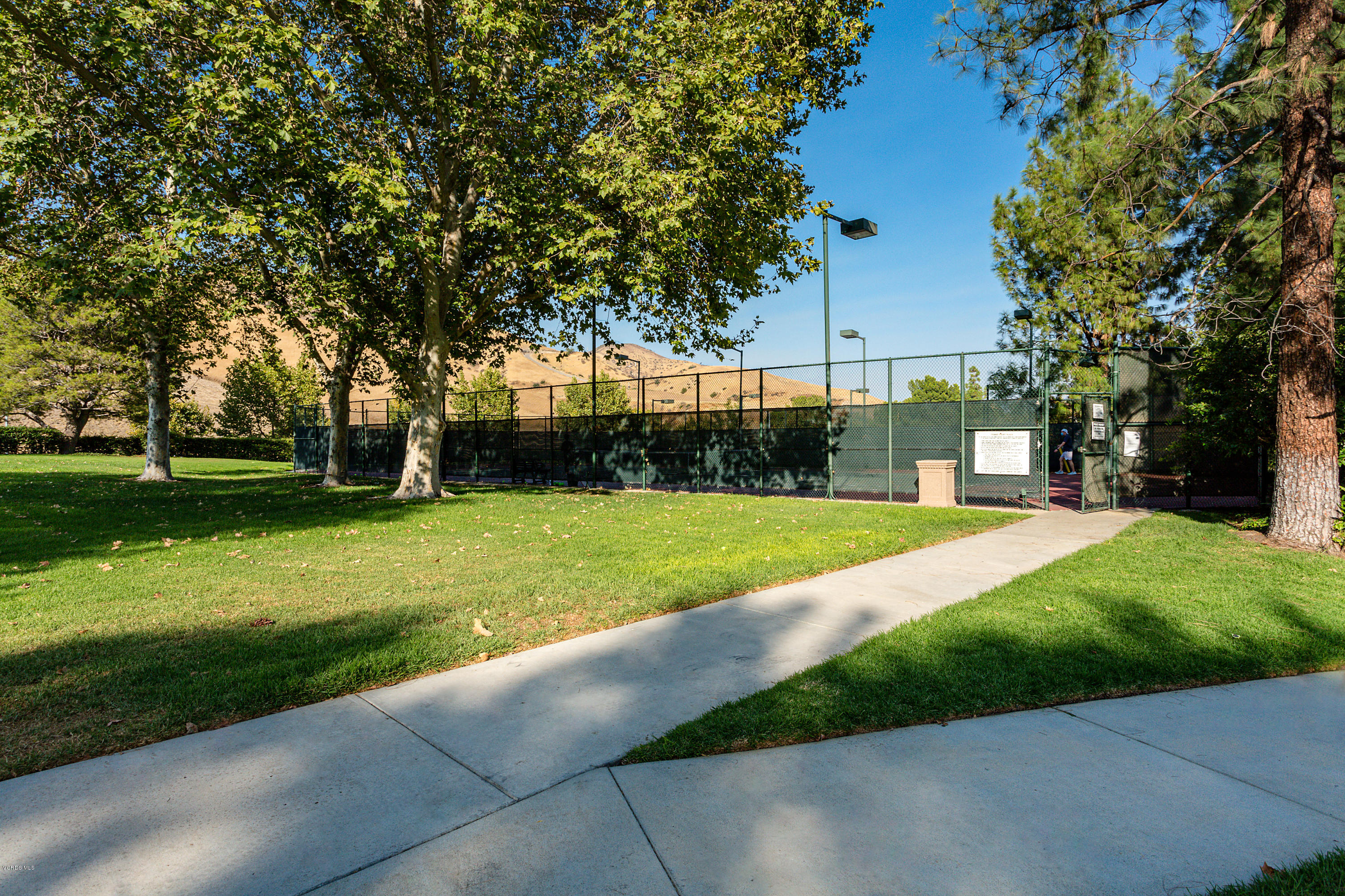 19641 Turtle Springs Way Porter Ranch, CA 91326 - Photo 2 of 31 a view of a park with large trees