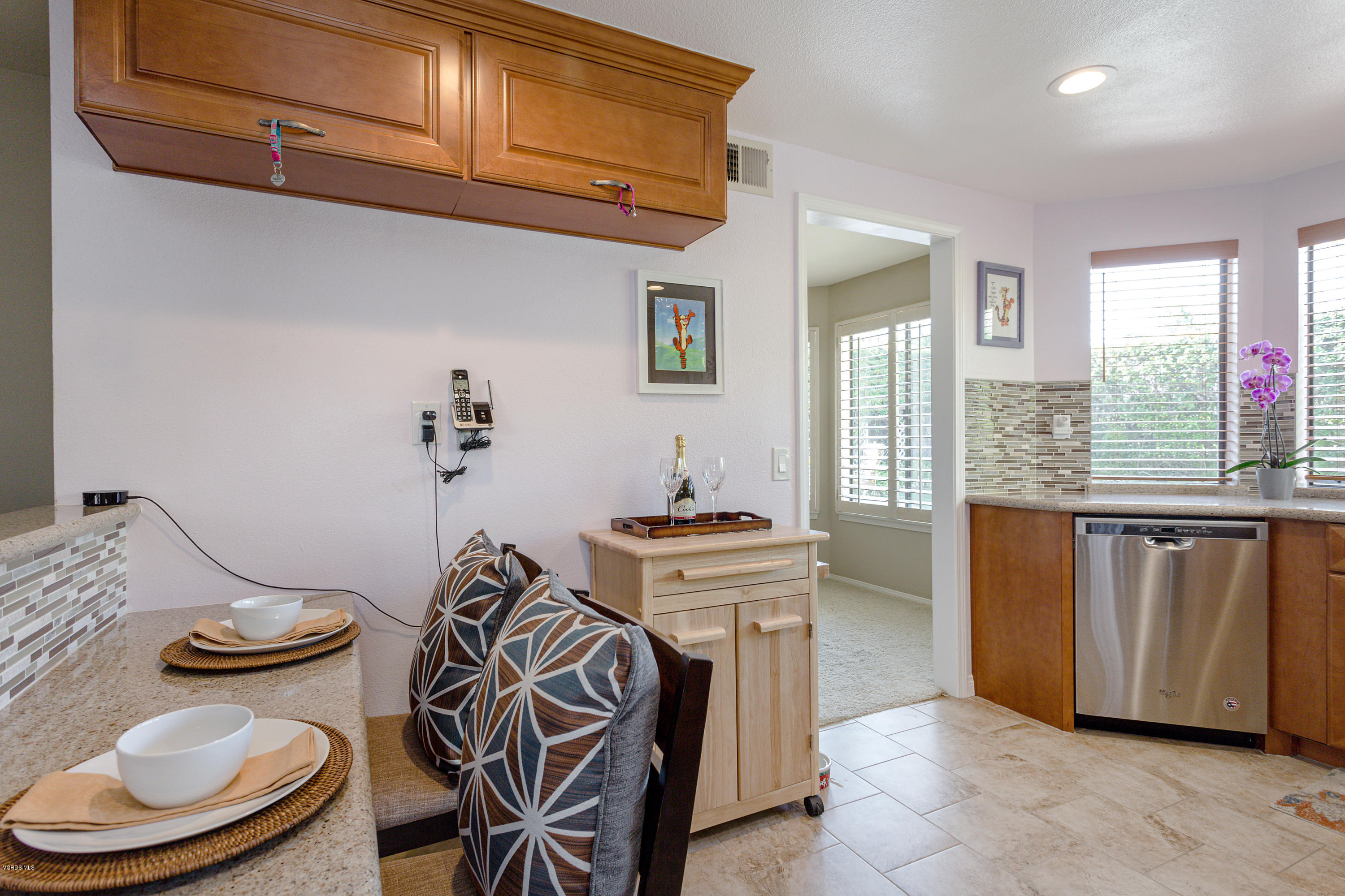 19641 Turtle Springs Way Porter Ranch, CA 91326 - Photo 12 of 31 a view of a dining room with furniture window and wooden floor