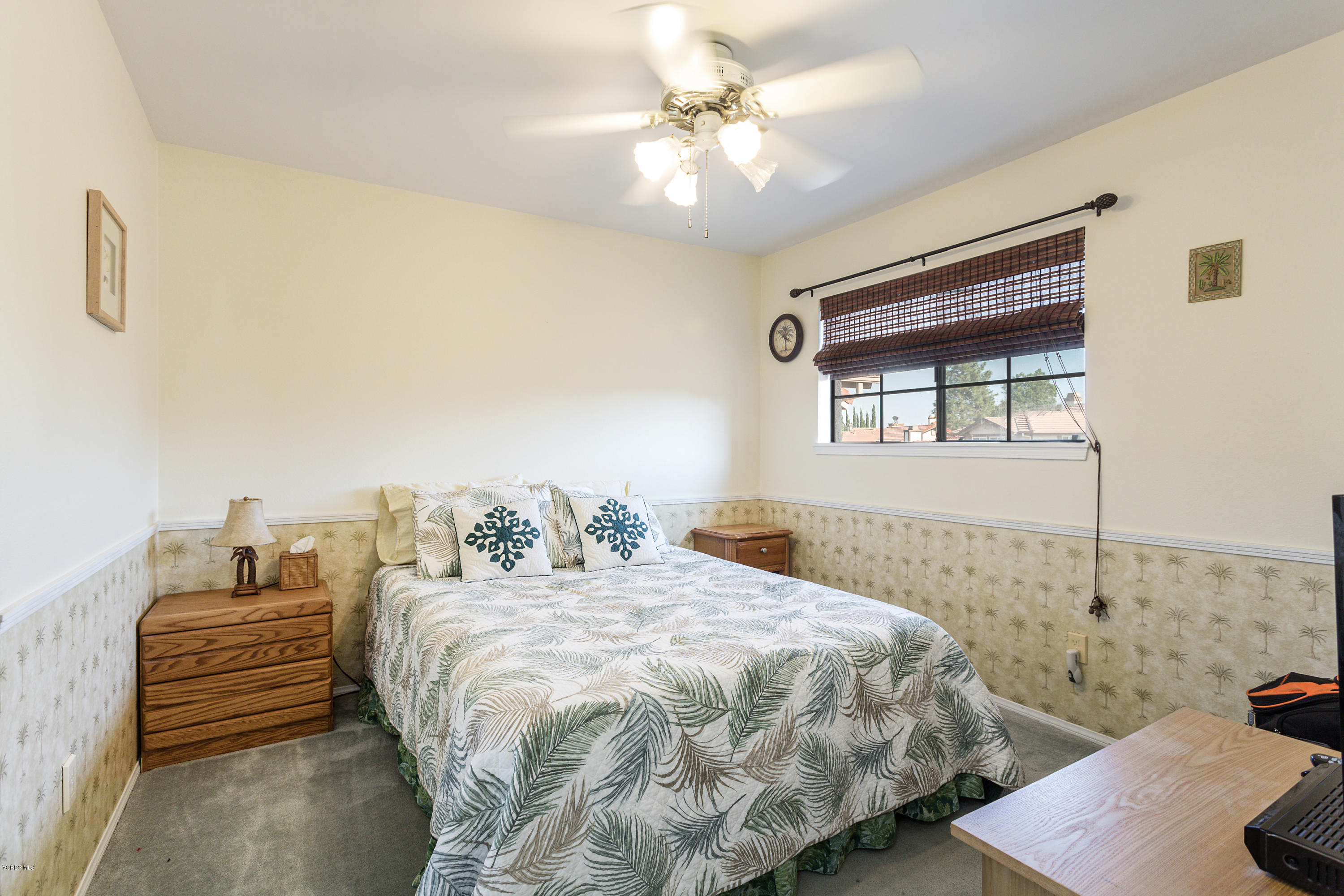 19641 Turtle Springs Way Porter Ranch, CA 91326 - Photo 22 of 31 a bedroom with a bed and a chandelier