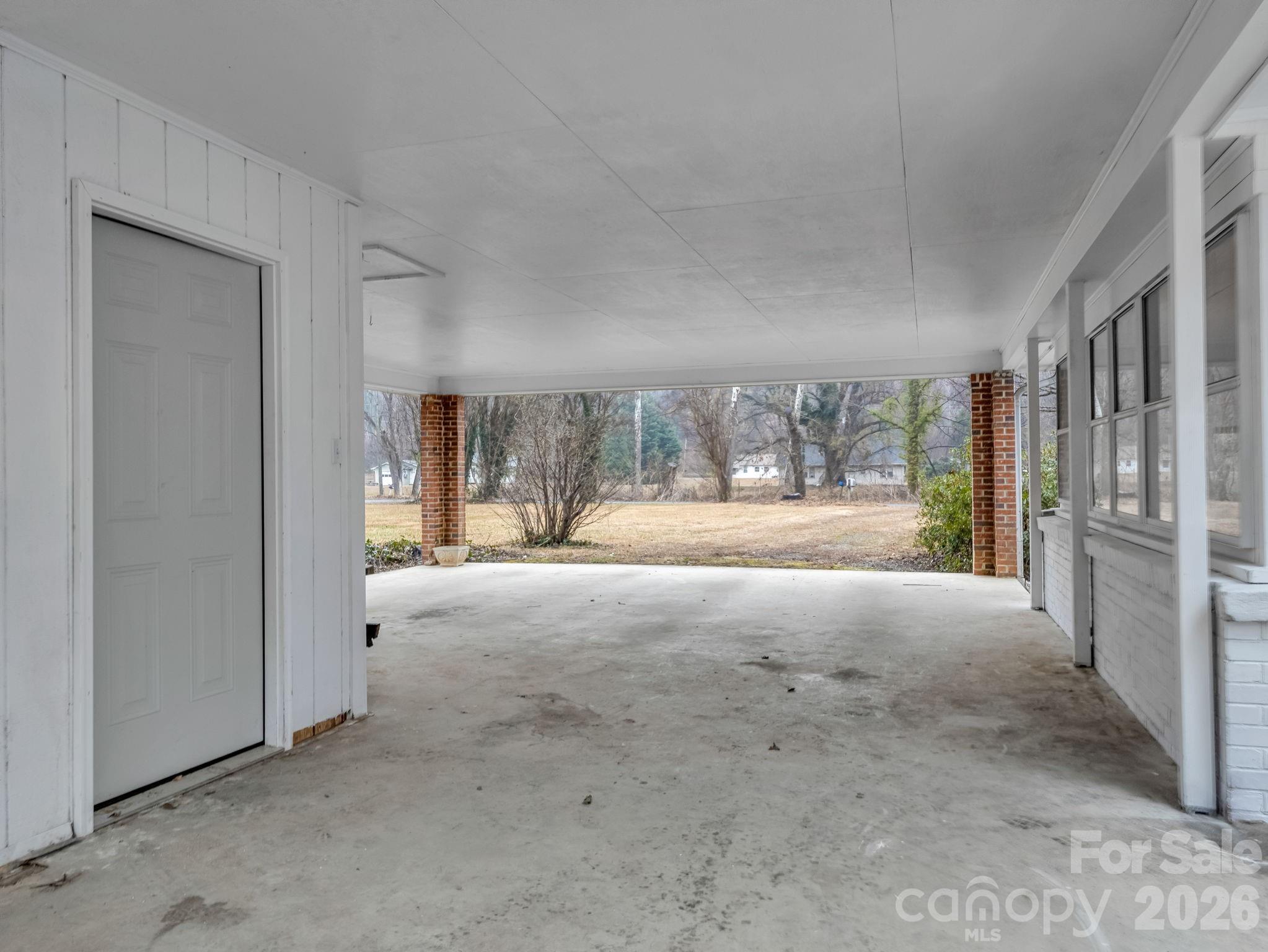 109 Wall Road Tryon, NC 28782 - Photo 24 of 30 a view of an empty room with a fireplace