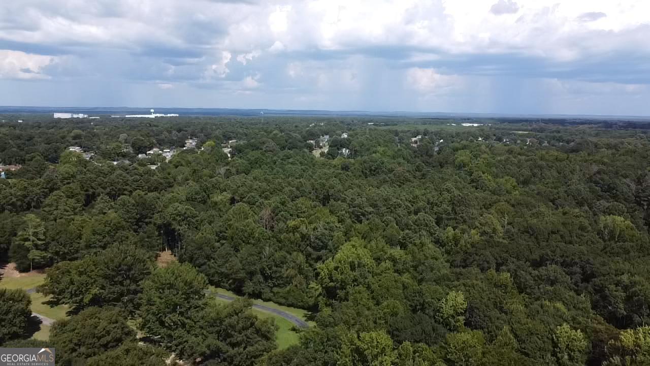 6045 Cara Drive Macon, GA 31216 - Photo 11 of 11 an aerial view of a city with lots of residential buildings