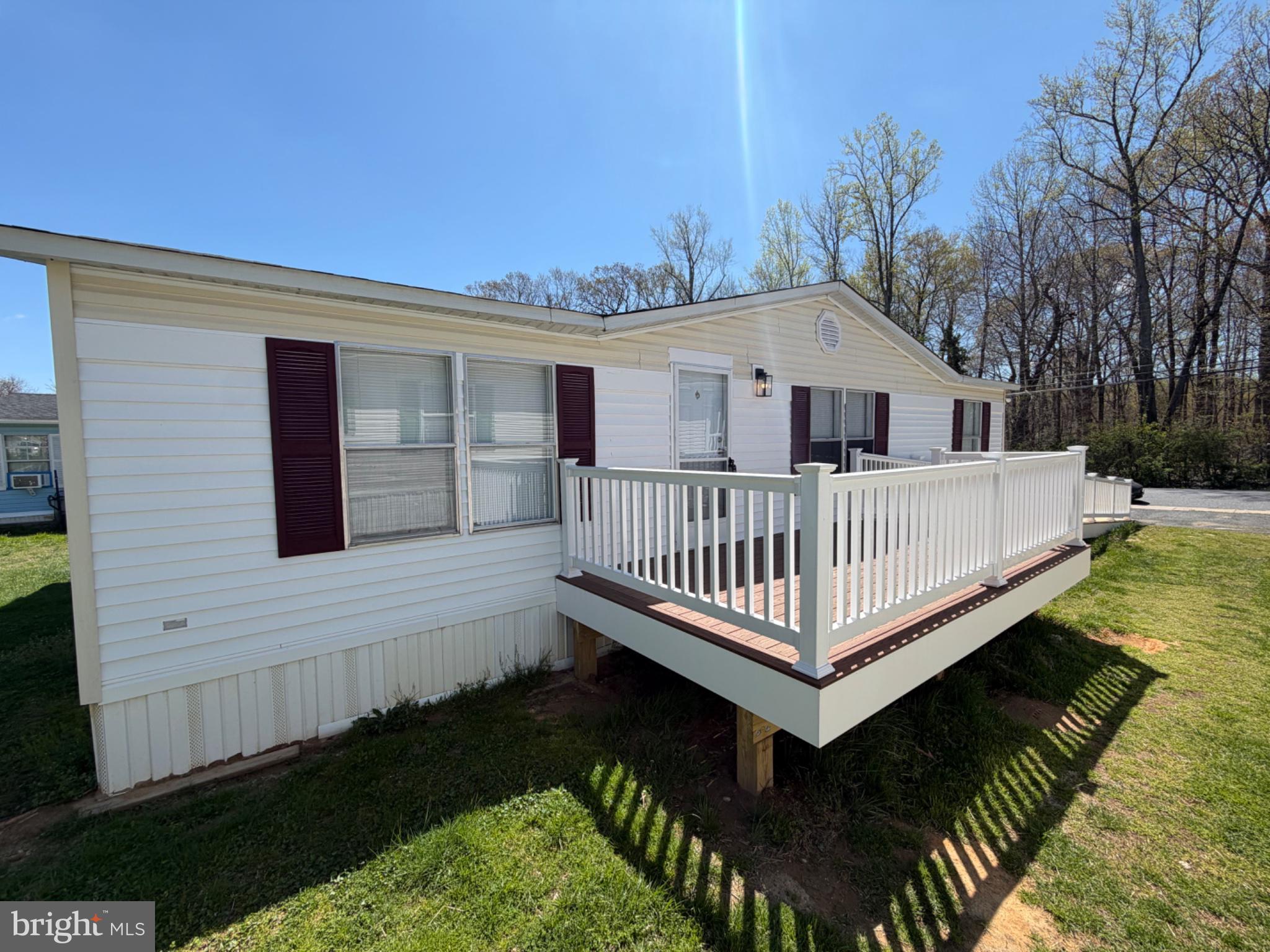 Charming home with inviting deck.
