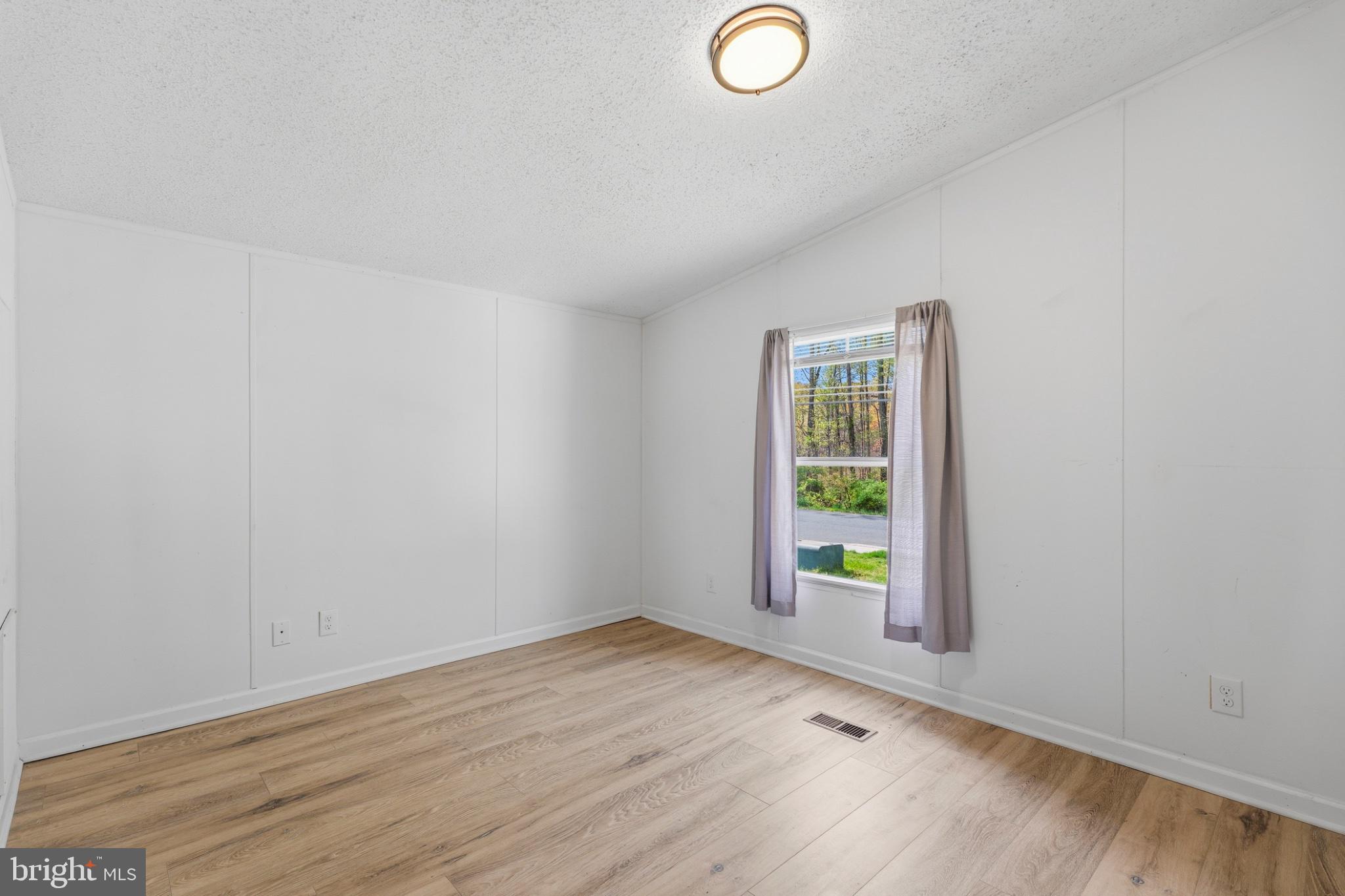 227 Forest Green Road Aberdeen, MD 21001 - Photo 15 of 23 a view of an empty room and window