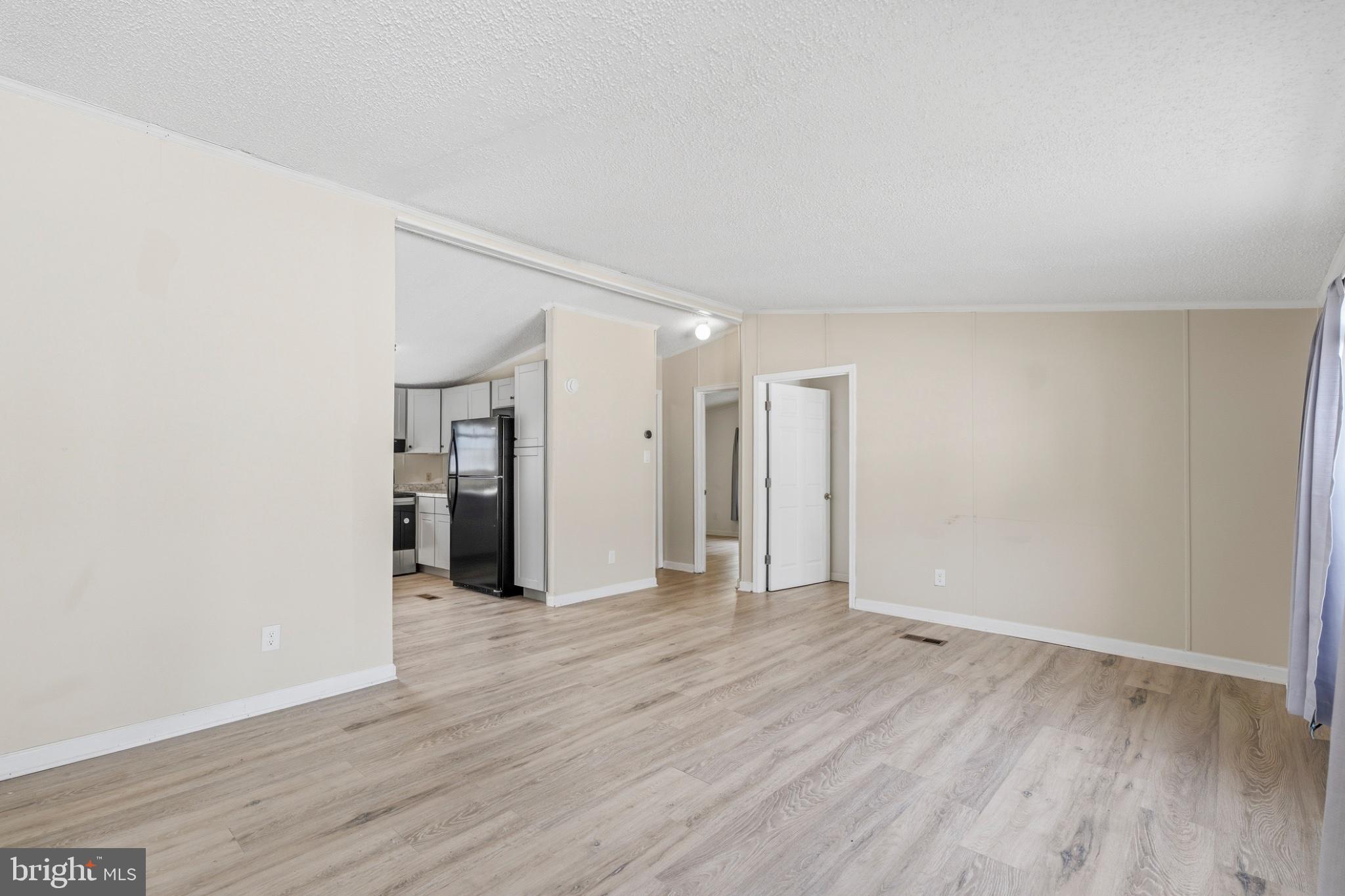 227 Forest Green Road Aberdeen, MD 21001 - Photo 4 of 23 a view of a room with wooden floor