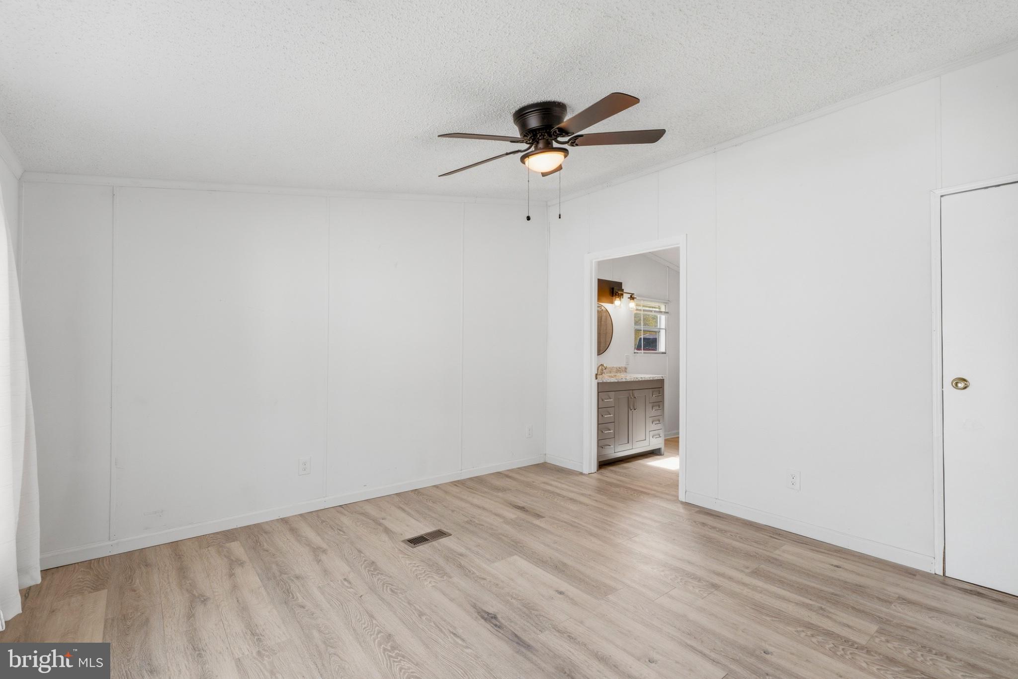 227 Forest Green Road Aberdeen, MD 21001 - Photo 6 of 23 a view of empty room with wooden floor