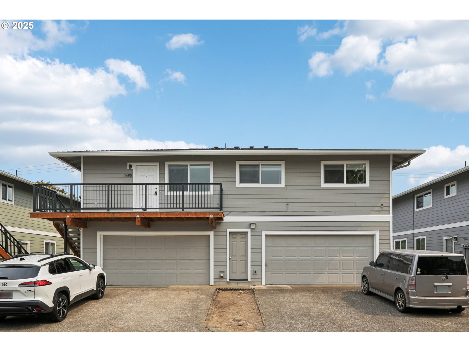 1495 Northeast Kane Drive Gresham, OR 97030 - Photo 2 of 48 a view of a car park in front of house