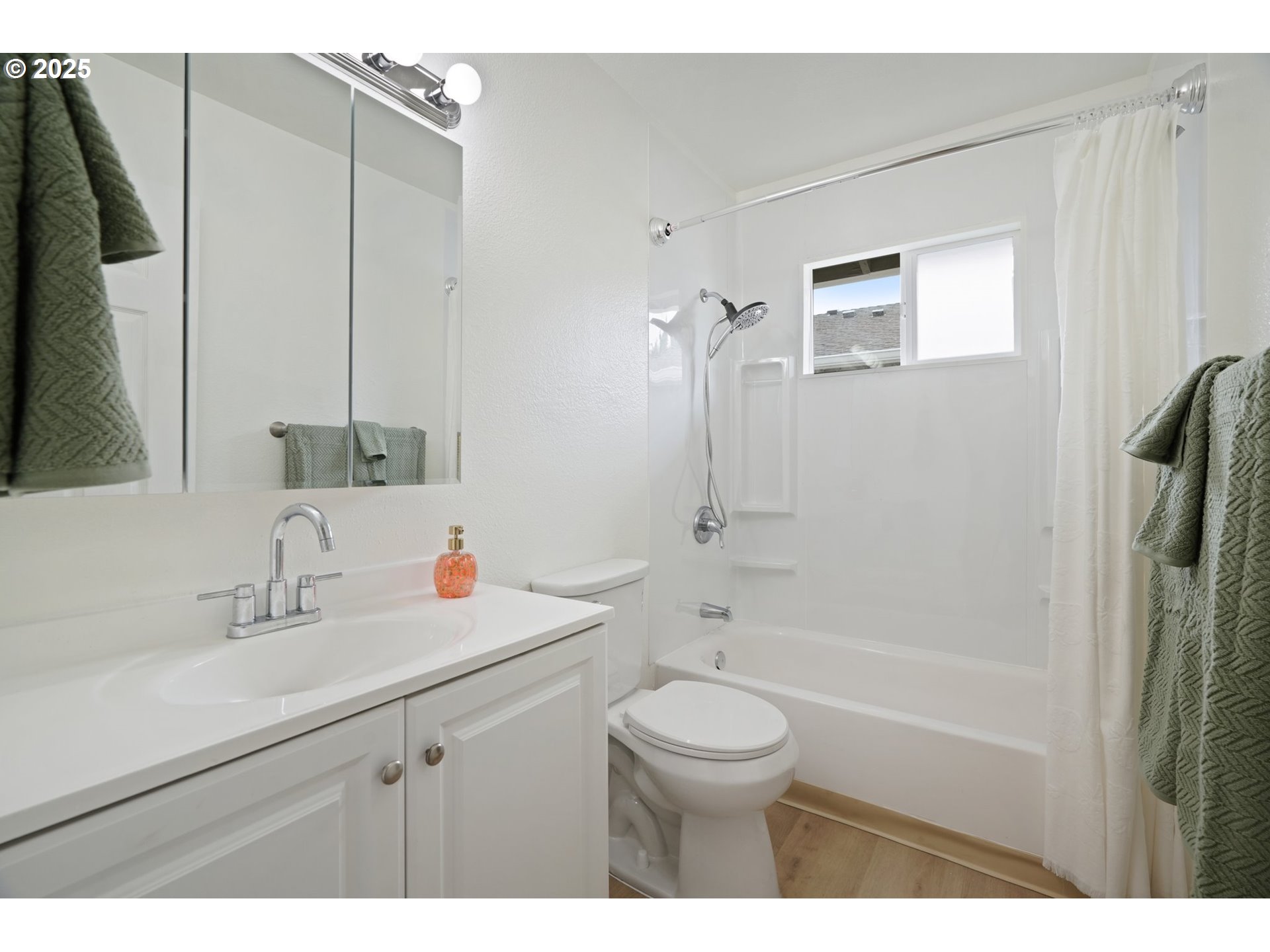 1495 Northeast Kane Drive Gresham, OR 97030 - Photo 24 of 48 a bathroom with a sink a toilet and shower