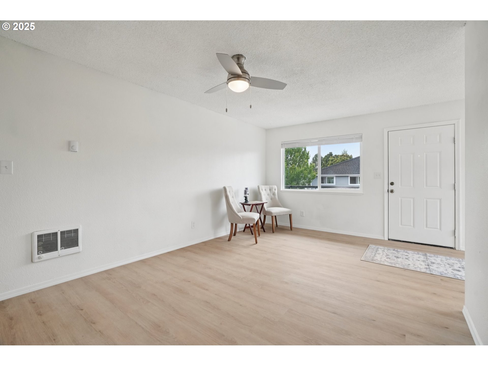1495 Northeast Kane Drive Gresham, OR 97030 - Photo 31 of 48 a view of an empty room with a window