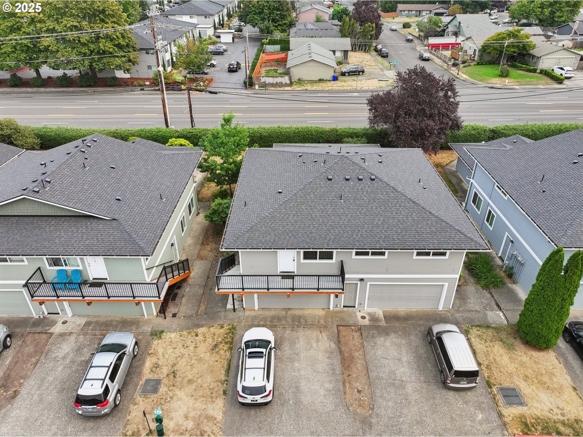 1495 Northeast Kane Drive Gresham, OR 97030 - Photo 46 of 48 an aerial view of a house with a garden