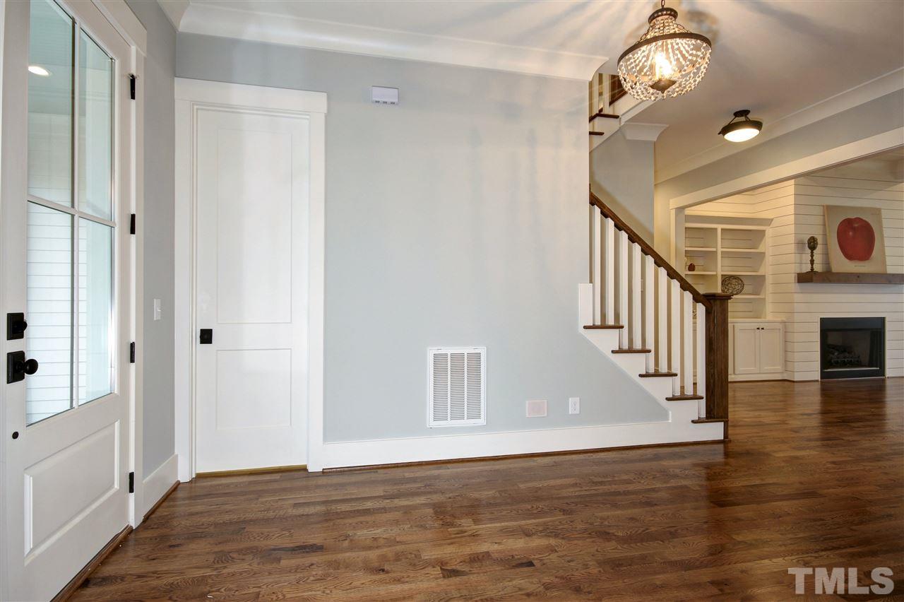 3311 Edgemont Drive Raleigh, NC 27612 - Photo 22 of 30 a view of an entryway with wooden floor
