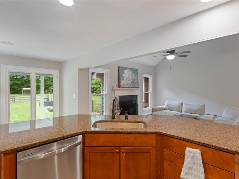 3904 Rowland Road Murfreesboro, TN 37128 - Photo 11 of 26 a kitchen with granite countertop a sink and a window