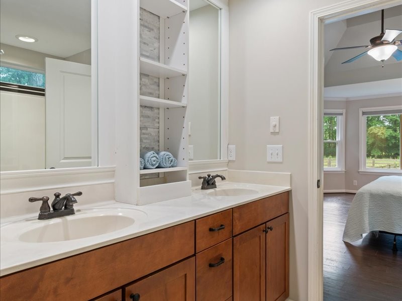3904 Rowland Road Murfreesboro, TN 37128 - Photo 17 of 26 a bathroom with a sink and a mirror
