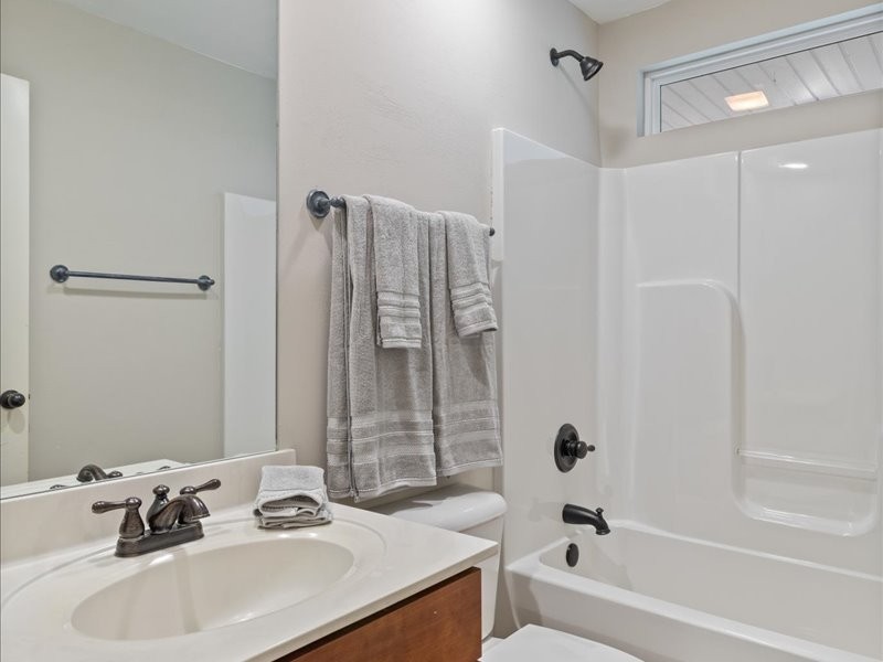 3904 Rowland Road Murfreesboro, TN 37128 - Photo 18 of 26 a bathroom with a sink and a tub