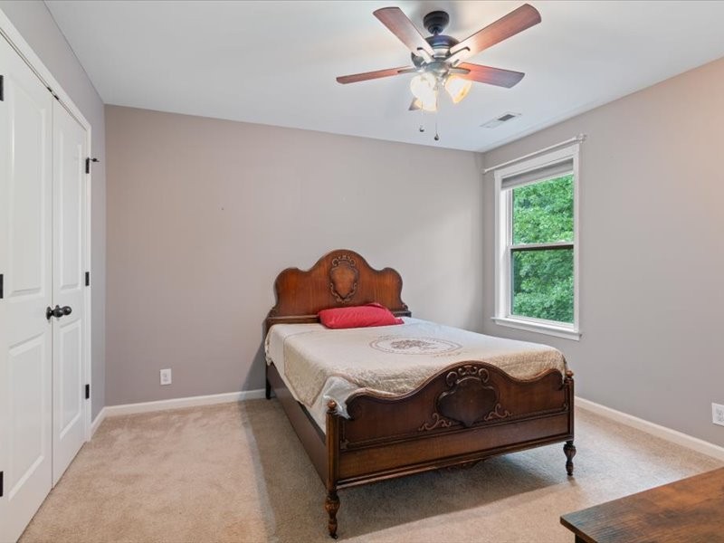 3904 Rowland Road Murfreesboro, TN 37128 - Photo 21 of 26 a bedroom with a bed and a window