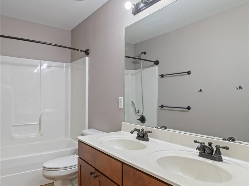 3904 Rowland Road Murfreesboro, TN 37128 - Photo 24 of 26 a bathroom with a sink toilet tub and shower