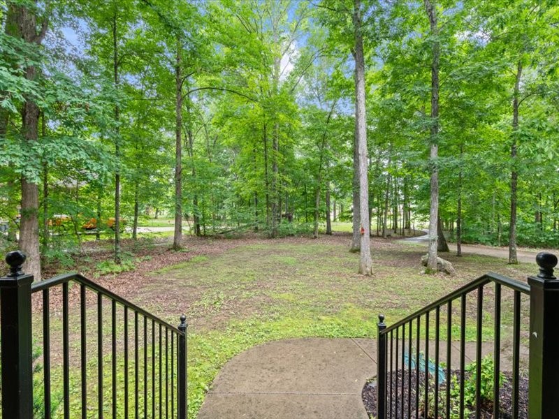 3904 Rowland Road Murfreesboro, TN 37128 - Photo 4 of 26 a view of a porch with a yard