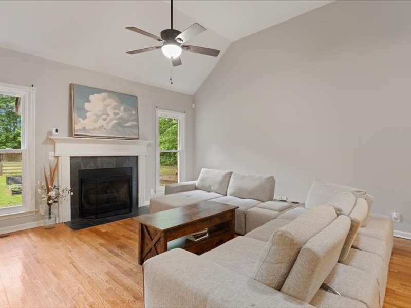 3904 Rowland Road Murfreesboro, TN 37128 - Photo 7 of 26 a bedroom with furniture and a fireplace