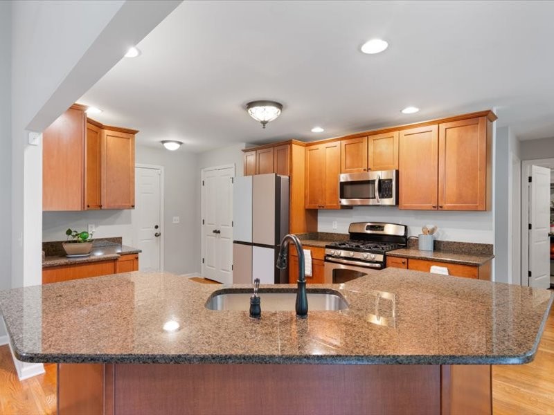 3904 Rowland Road Murfreesboro, TN 37128 - Photo 10 of 26 a kitchen with stainless steel appliances granite countertop a refrigerator a stove top oven a sink and dishwasher
