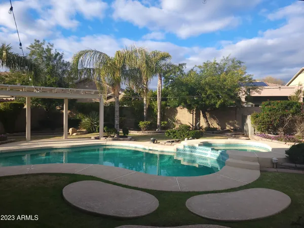 a view of a swimming pool with an outdoor space