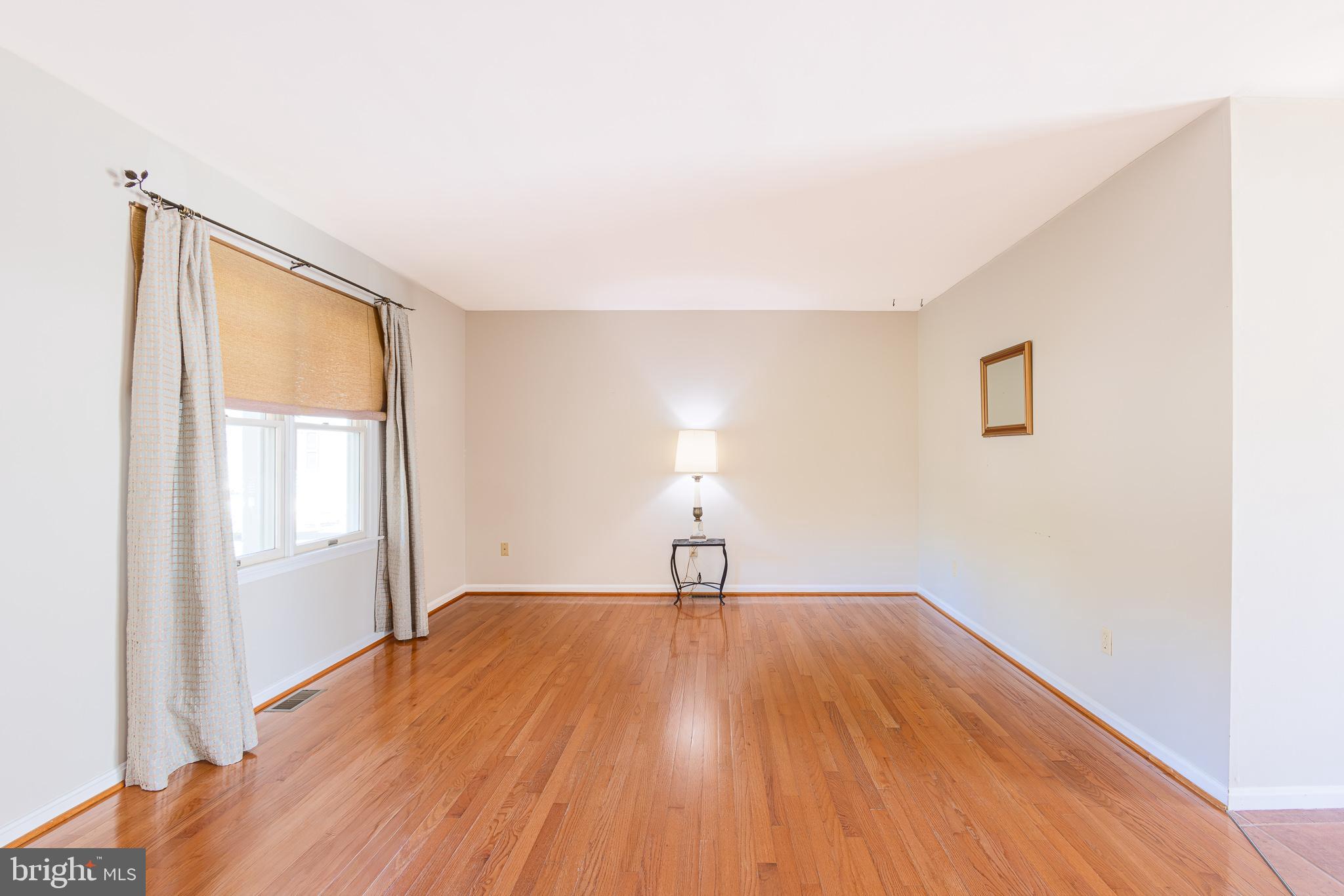 312 Spring Drive Easton, MD 21601 - Photo 7 of 32 Living room with hardwood floor