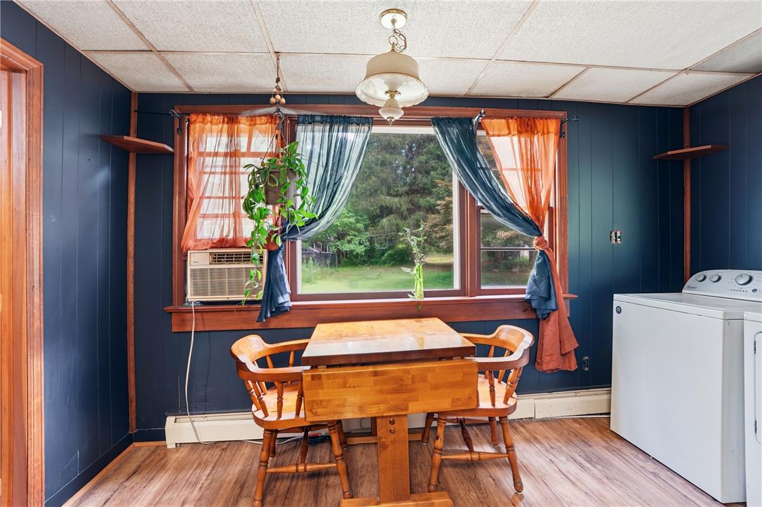 3573 Lower Saucon Road Hellertown, PA 18055 - Photo 12 of 56 Rich wood trim frames a large window overlooking the leafy backyard.