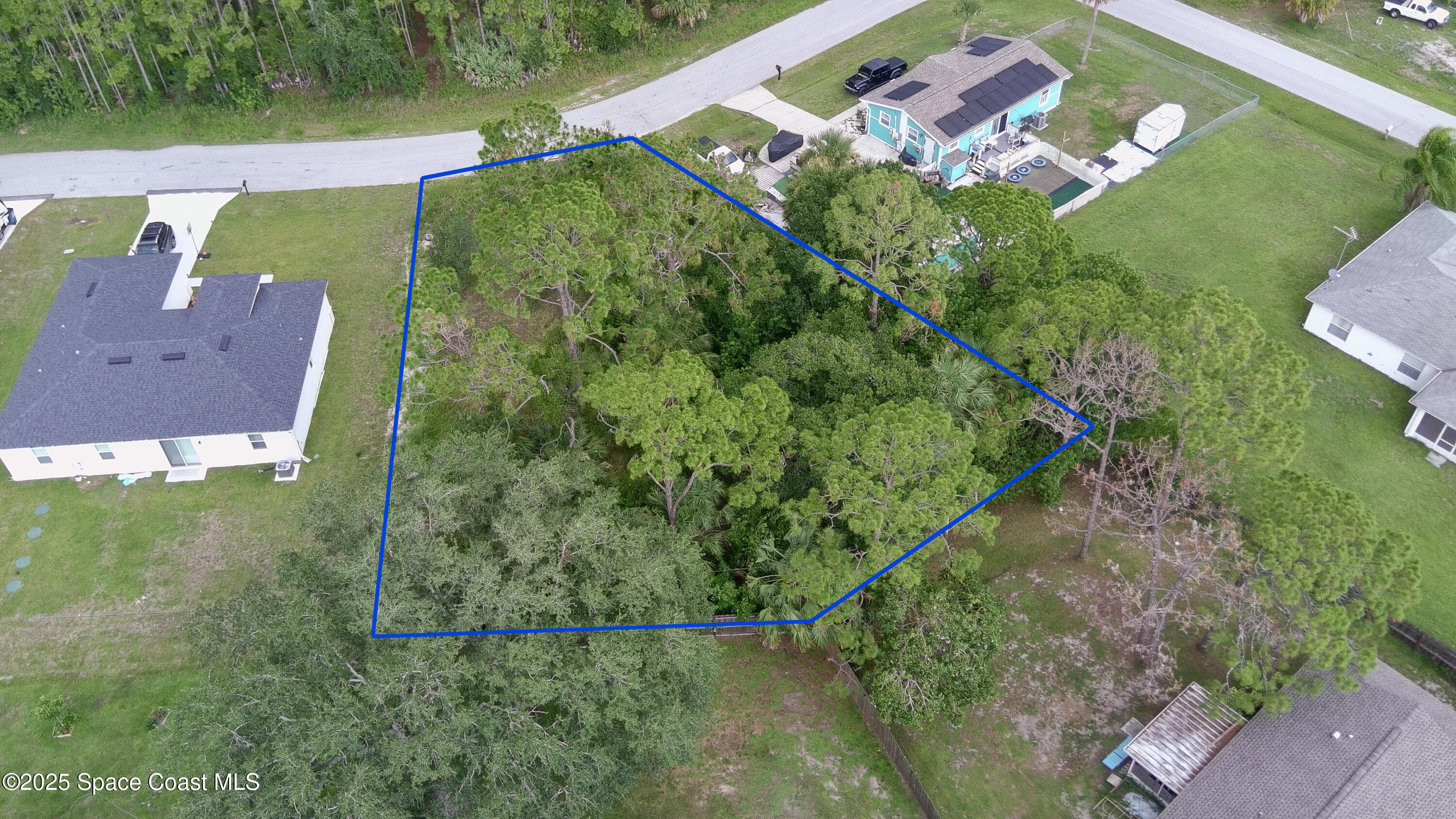 405 Tilhal Road Southwest Palm Bay, FL 32908 - Photo 10 of 13 an aerial view of a house