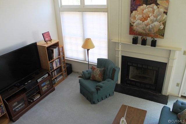 5405 Chestnut Bluff Road Midlothian, VA 23112 - Photo 17 of 19 a living room with furniture and a flat screen tv