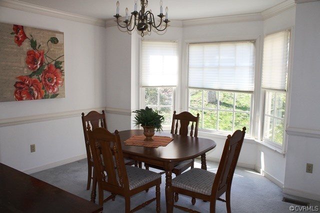 5405 Chestnut Bluff Road Midlothian, VA 23112 - Photo 18 of 19 a view of a dining room with furniture window and outside view